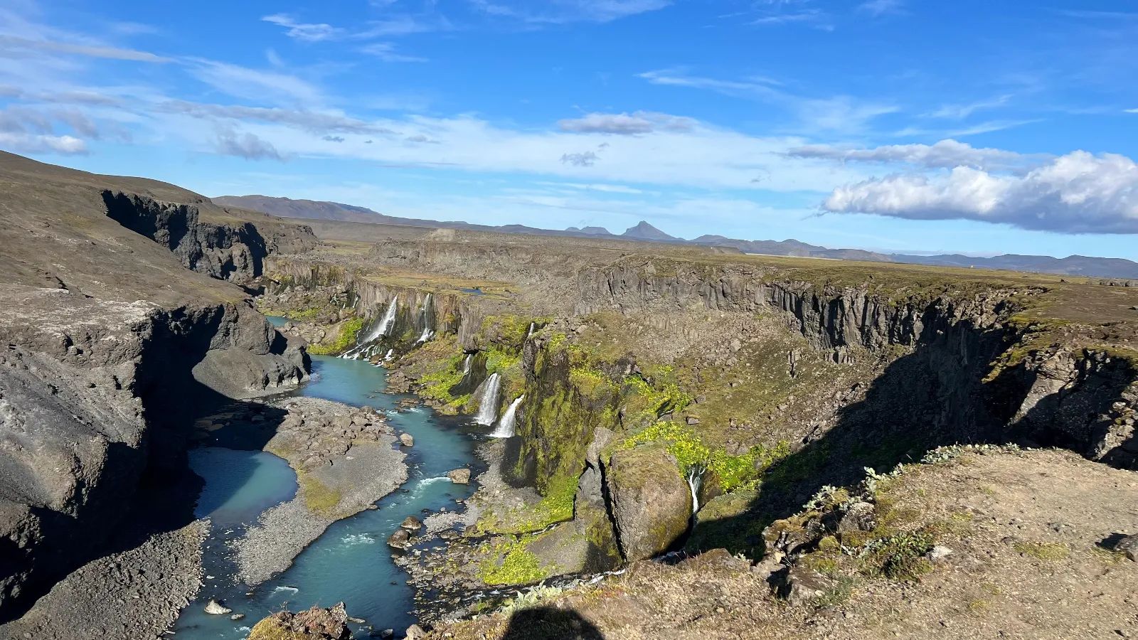 Canyon waterfall view from dramatic highland viewpoint