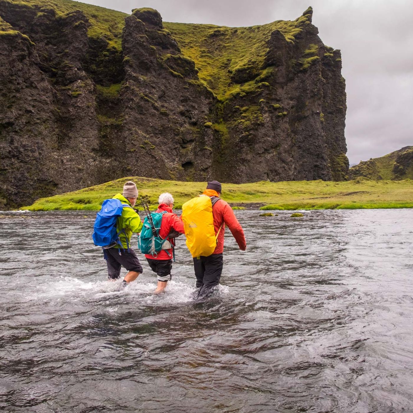 Hiking through Skaftá river with rapids