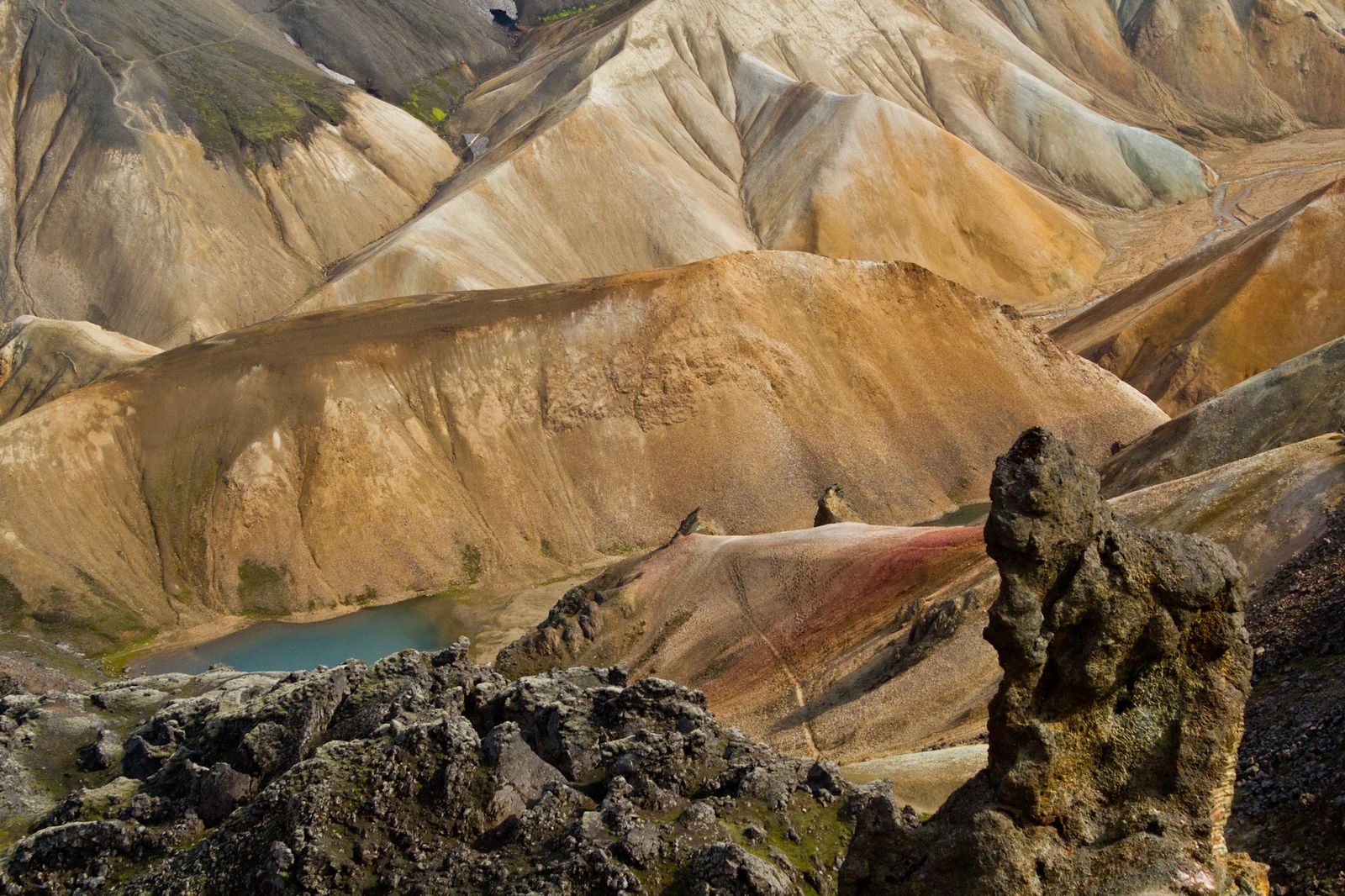 Icelandic mountain landscape with pond reflection