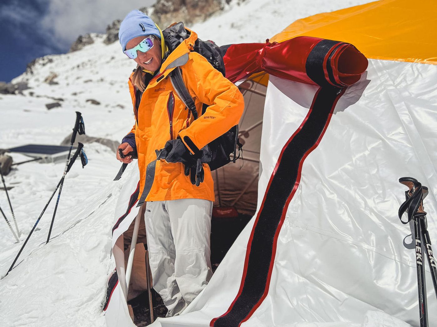 Climber near tent at snowy high camp on Aconcagua
