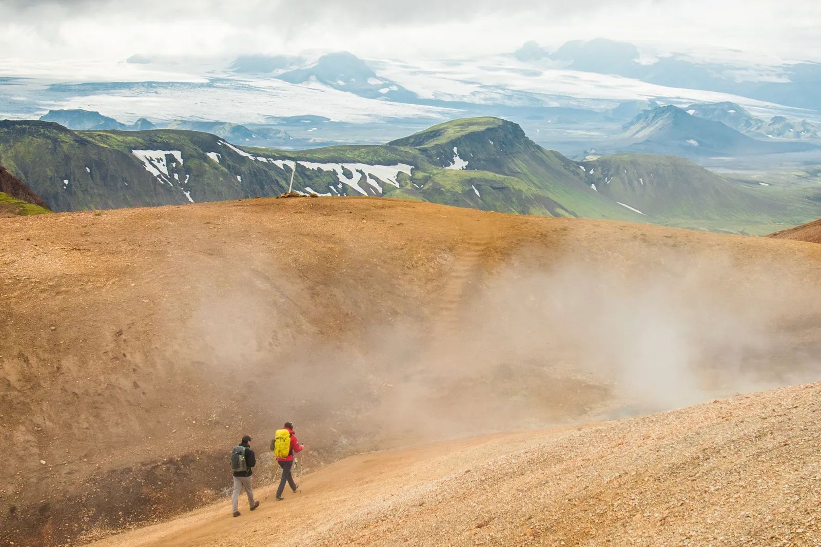 Laugavegur - couple of hikers crossing threw mountains