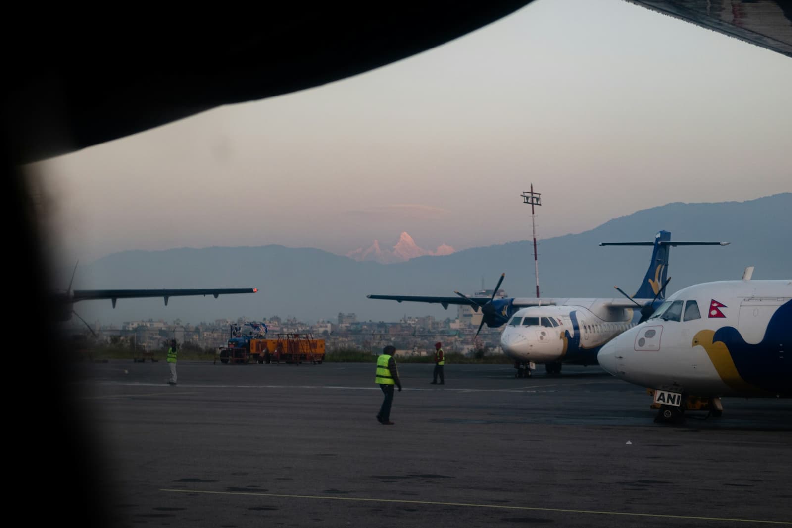 Plane on the runway in Nepal at the end of the Manaslu Circuit adventure