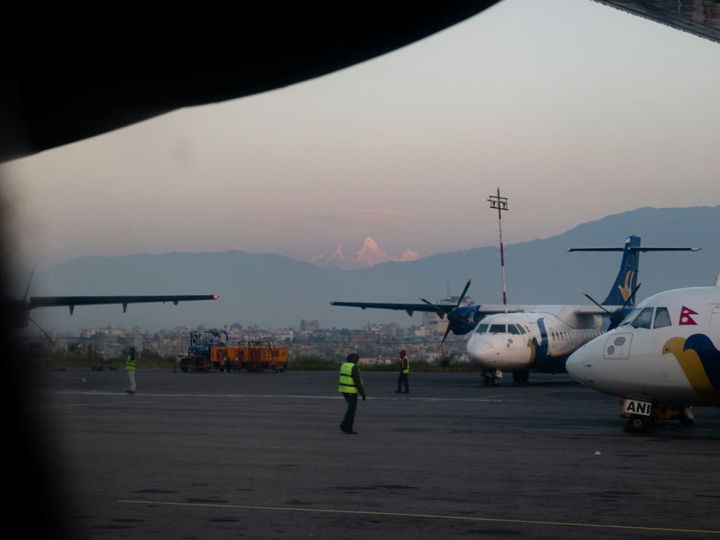 Plane on the runway in Nepal at the end of the Manaslu Circuit adventure