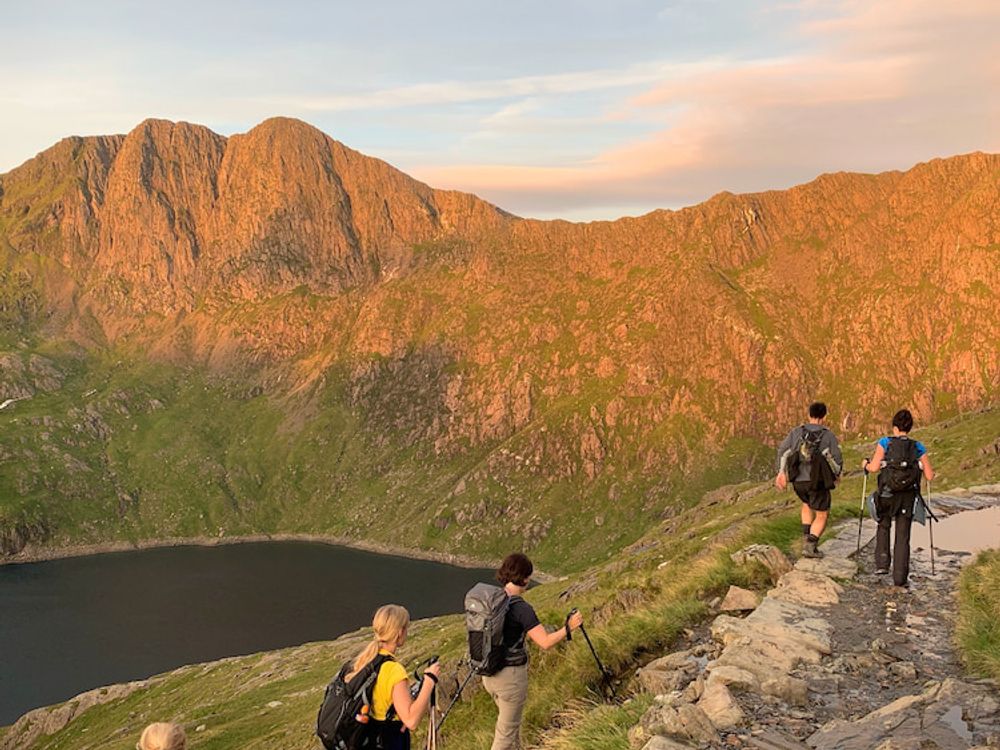 Mountain leader guiding a group