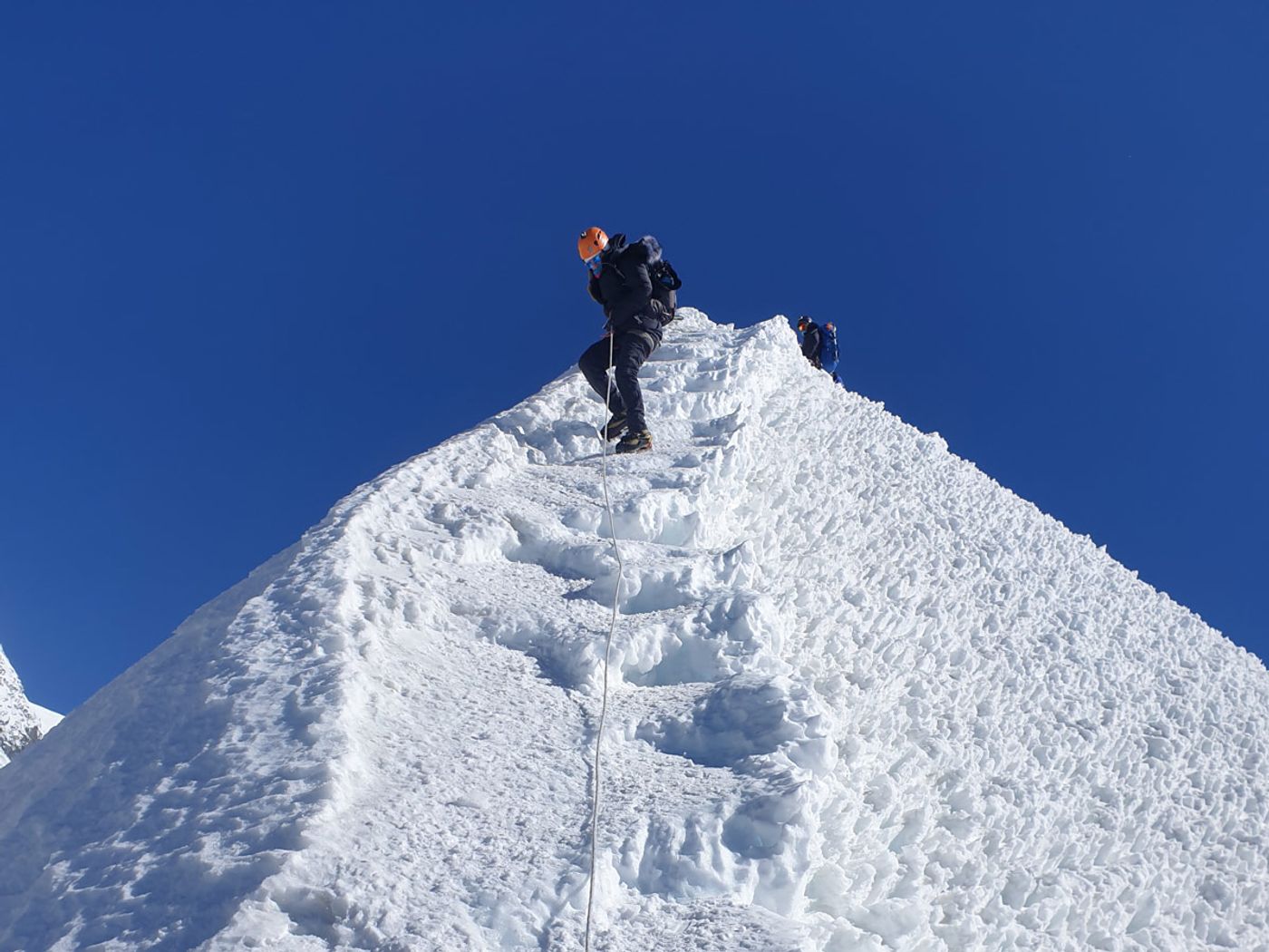 Rope climb up for summiting