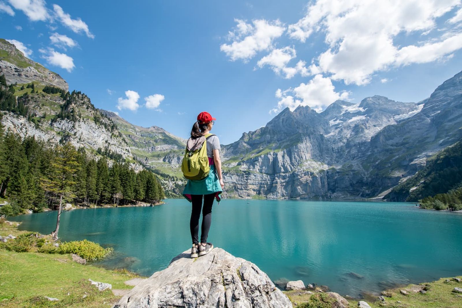 Tour des Dents du Midi - Lady hiking in switzerland overlooking lake and mountains