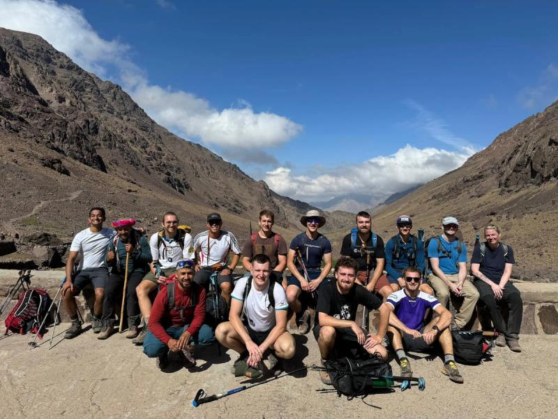group sit at a viewing point