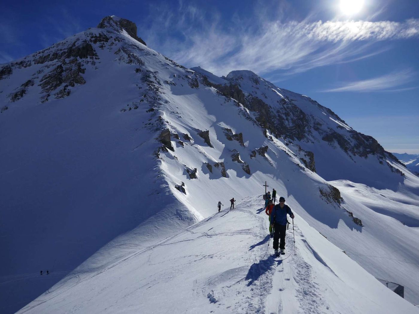 Hiking in line on mountain ridge
