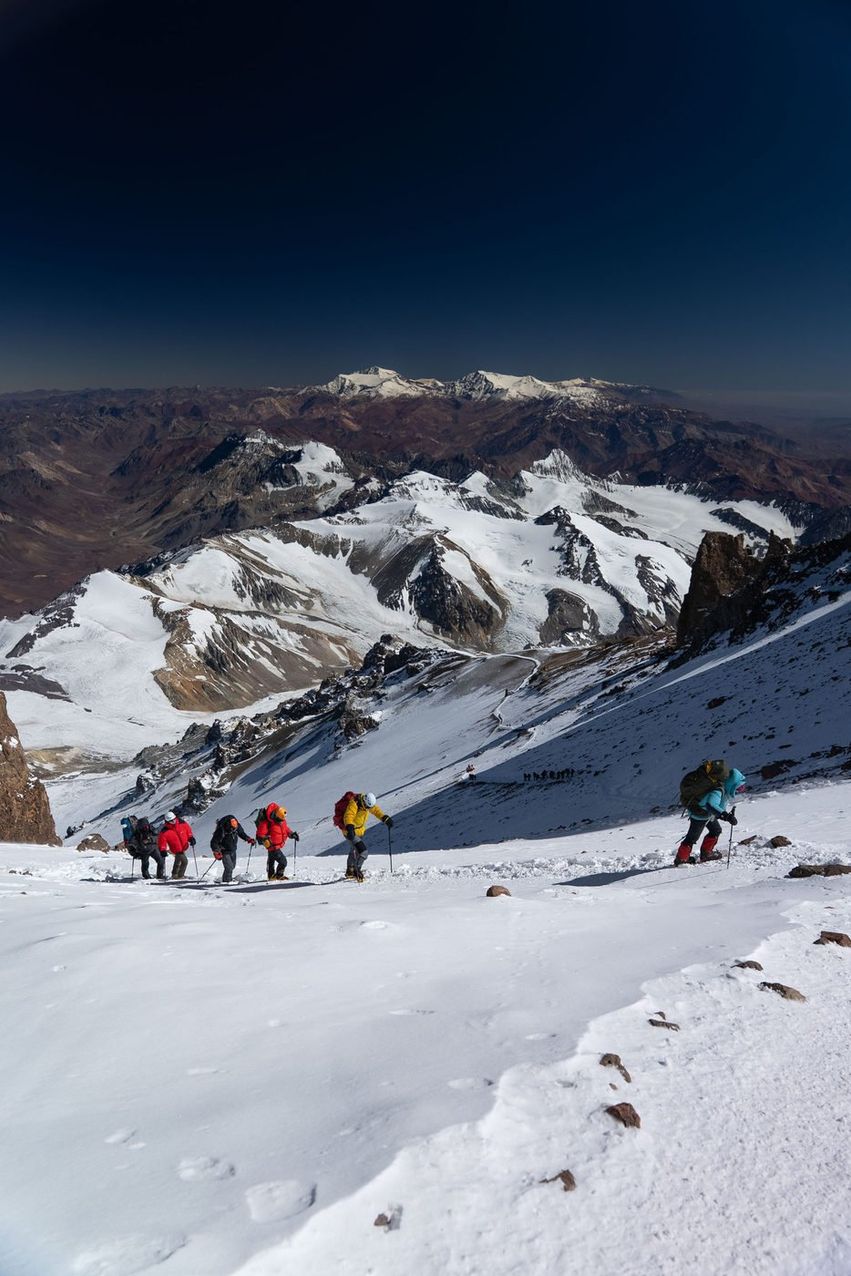 Mountaineers climbing through snow in the Andes on Aconcagua