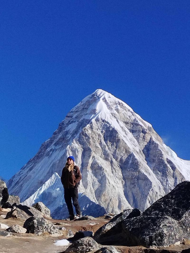 Everest Base Camp trekker near a peak