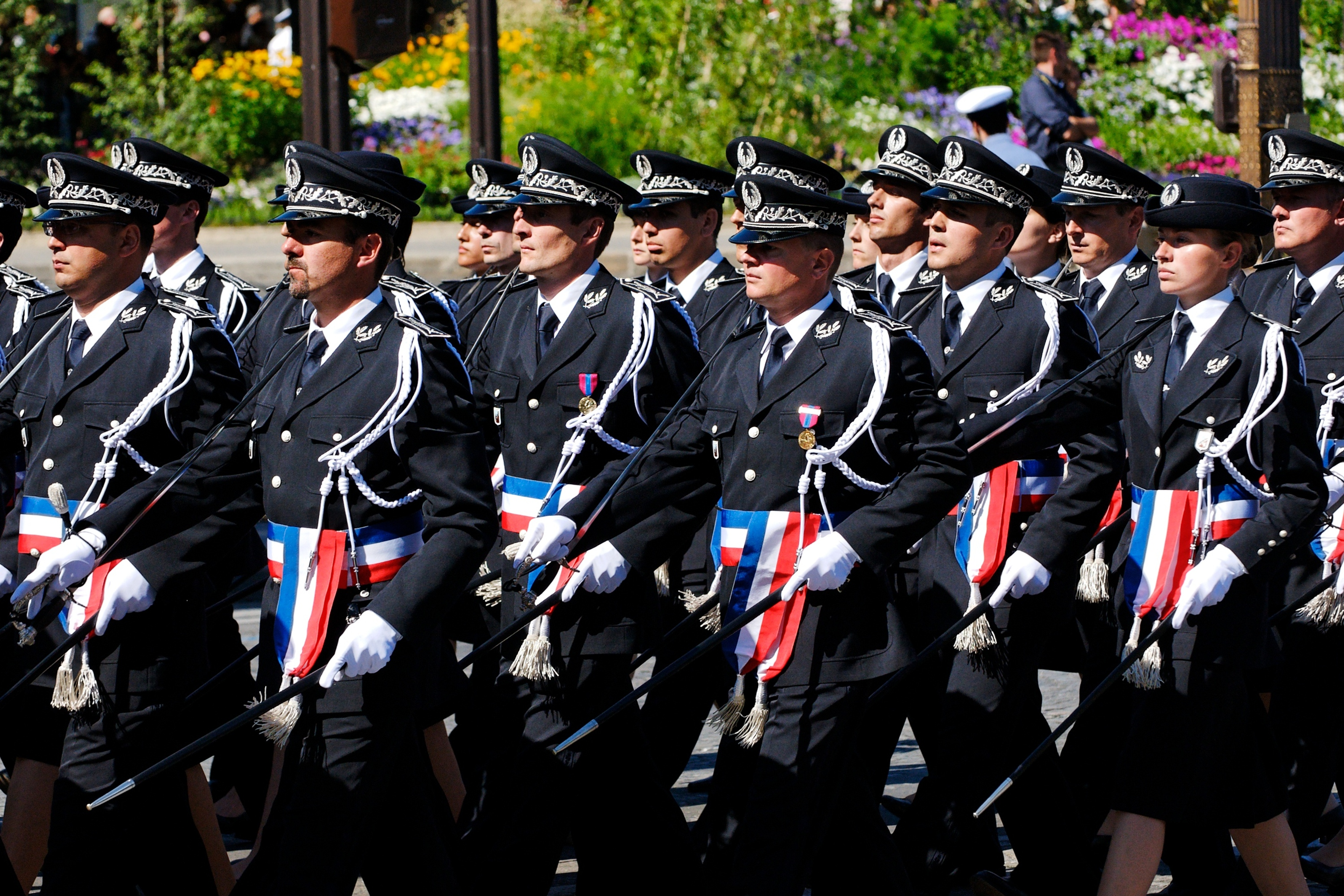 French police officers marching during nationwide protests in France.
