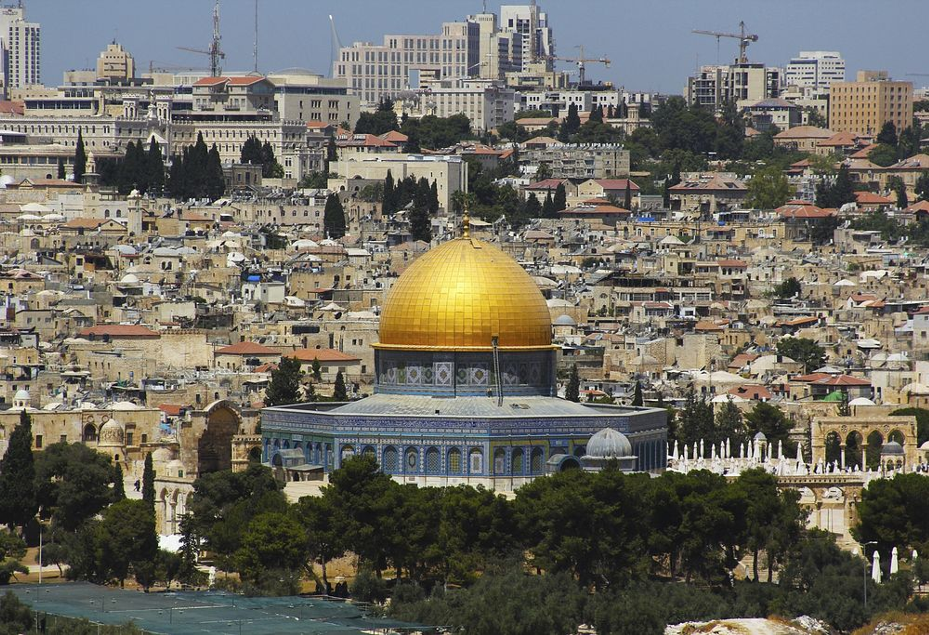 Dome of the Rock in Jerusalem with the cityscape in the background.