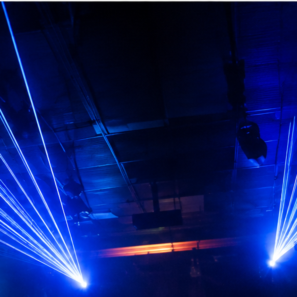Blue laser effects lighting up the venue