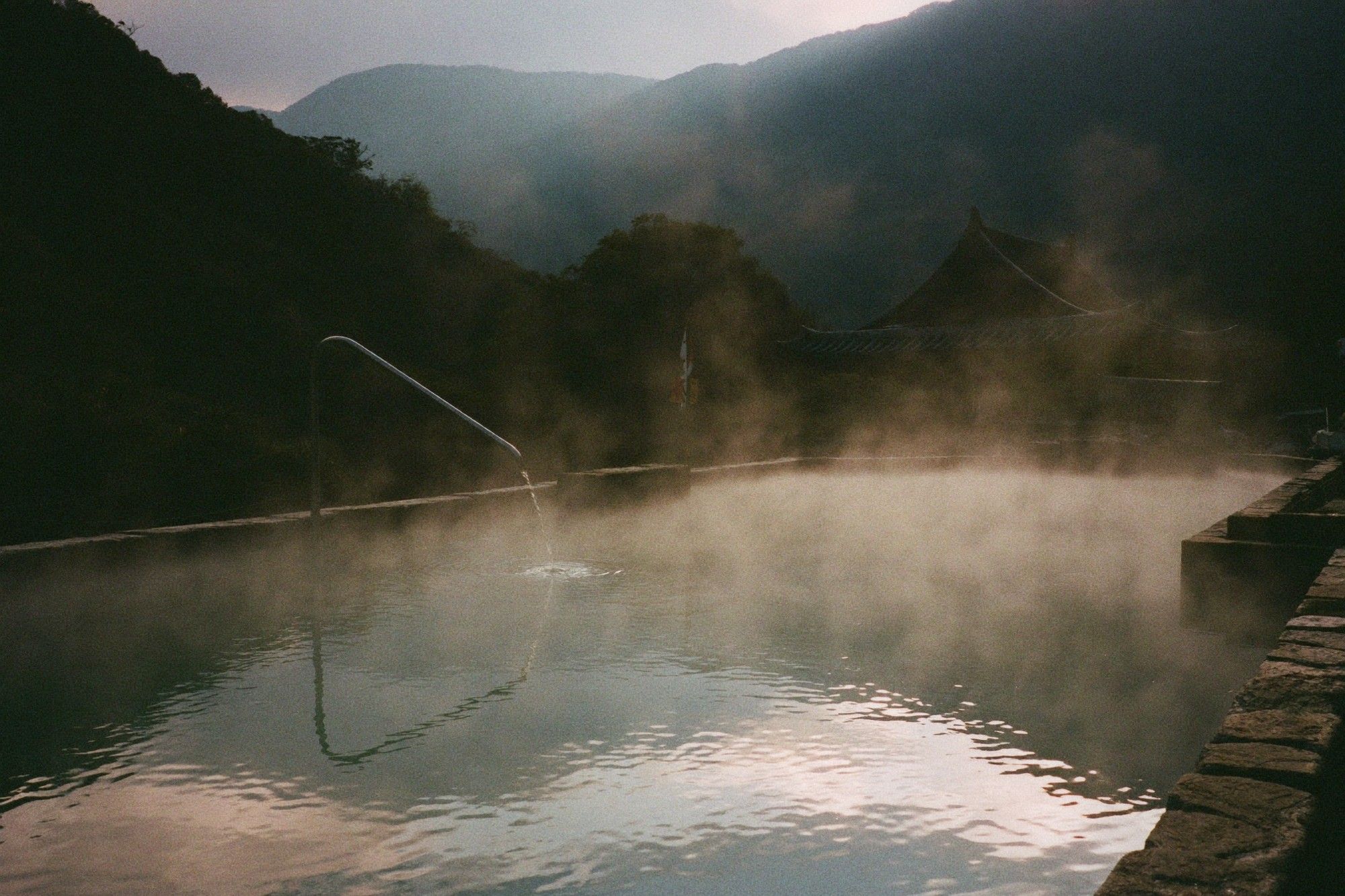 Mountain hot spring with steam