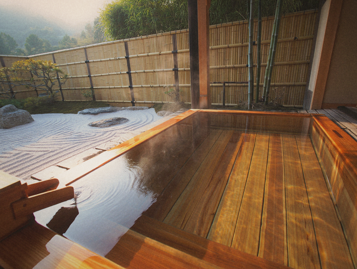 Serene Japanese-style outdoor stone hot spring bath surrounded by bamboo garden in Jiaoxi, Yilan, Taiwan
