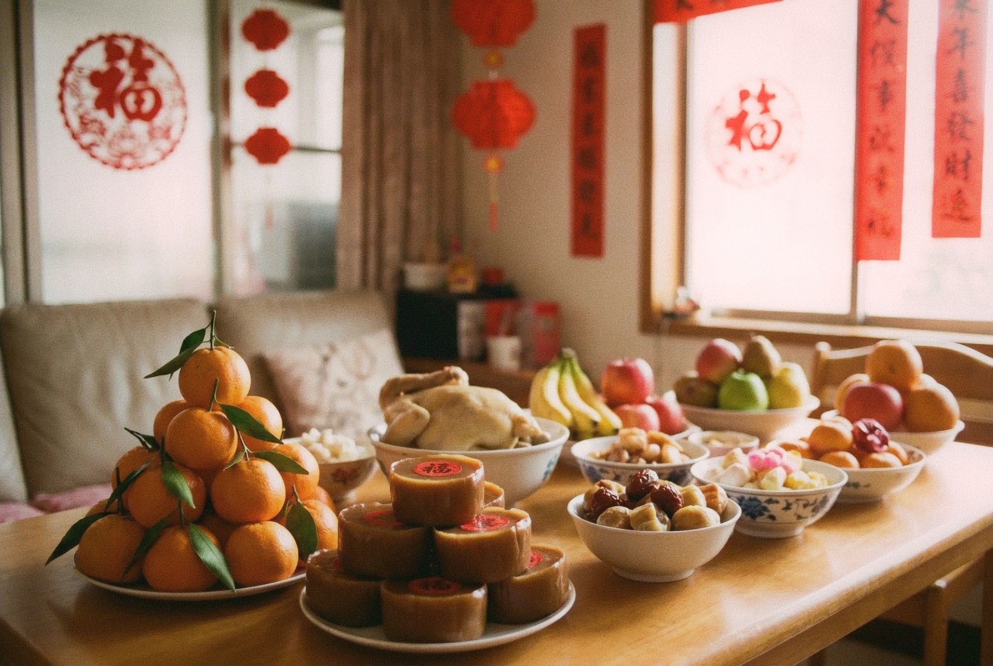 Lunar New Year festival food offerings arranged on a table