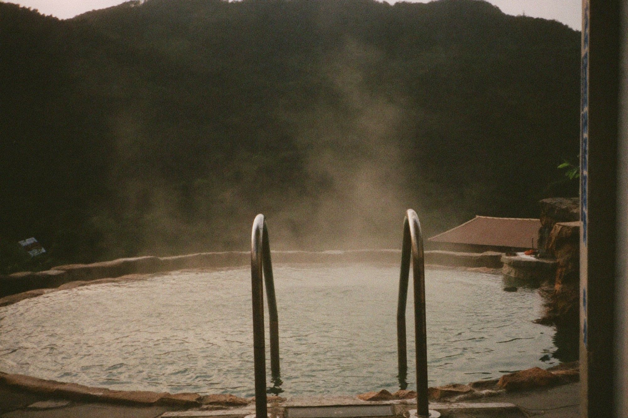 Mountain hot spring with steam