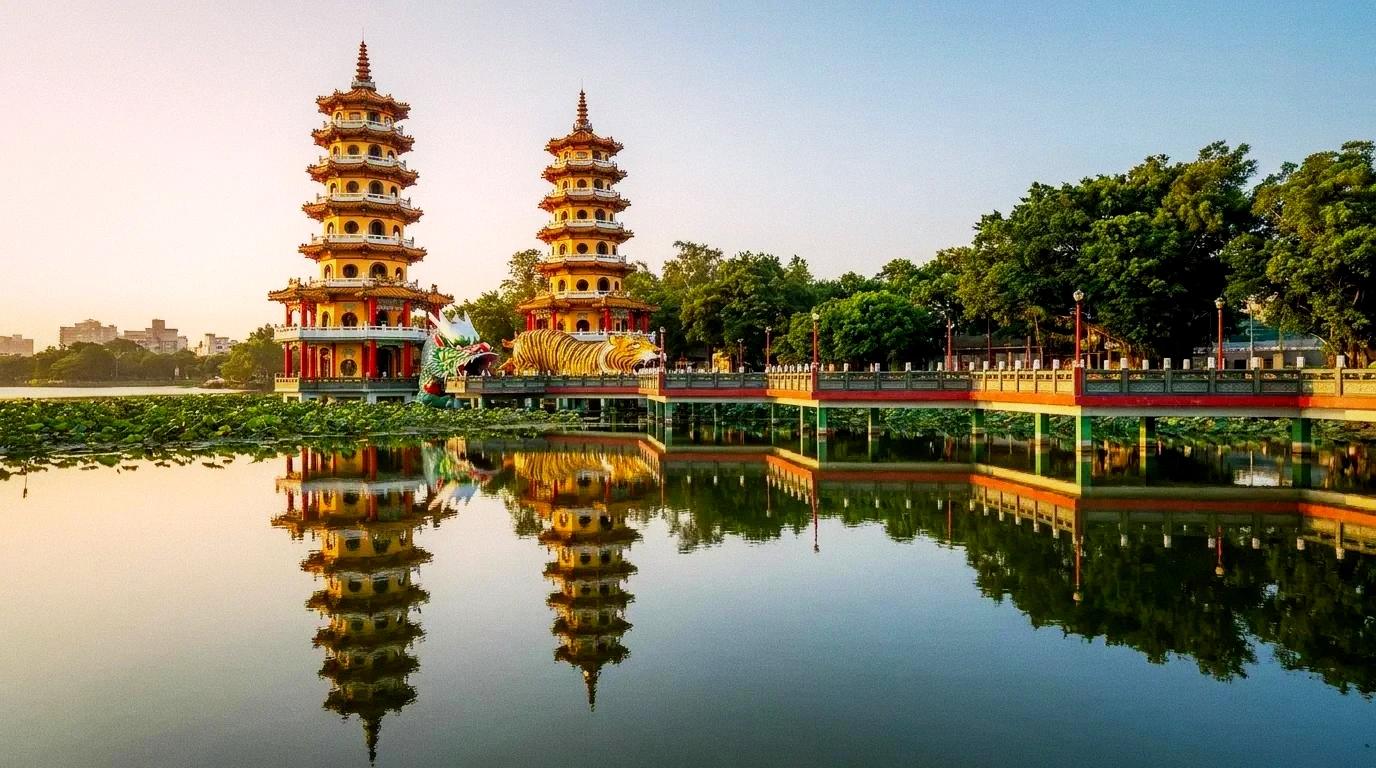 Lotus Pond with Dragon and Tiger Pagodas reflected on the water at golden hour