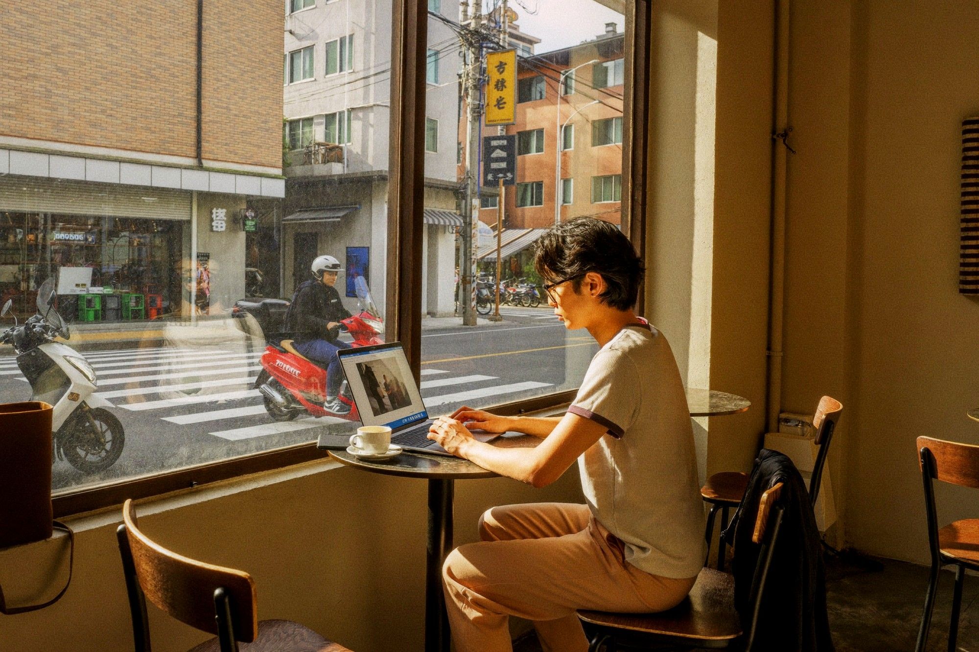 Working on a laptop in a Taipei cafe