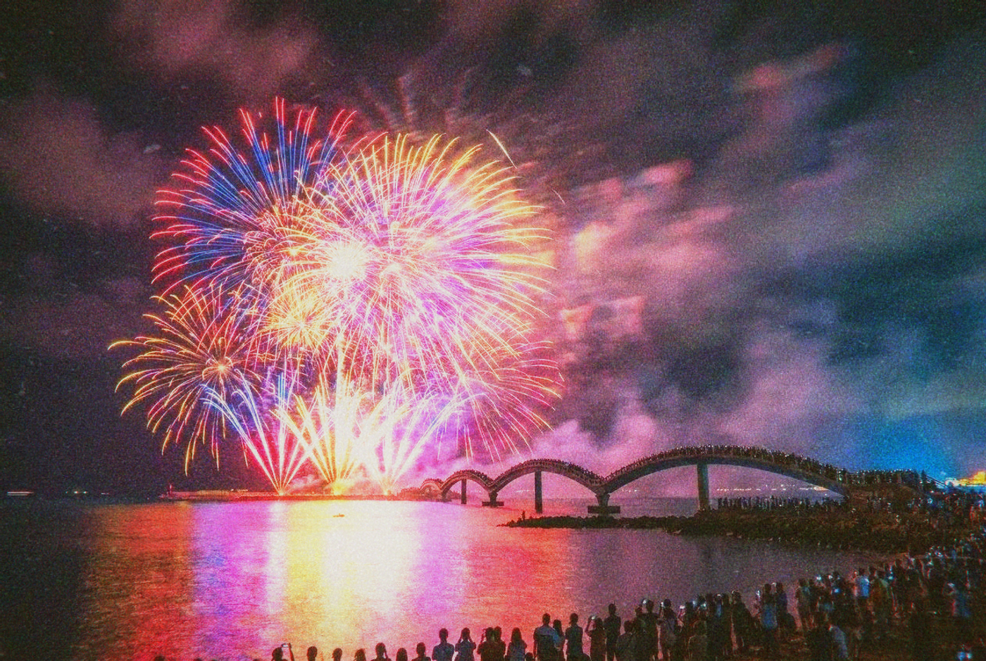 Penghu fireworks festival at night with colorful fireworks over the ocean