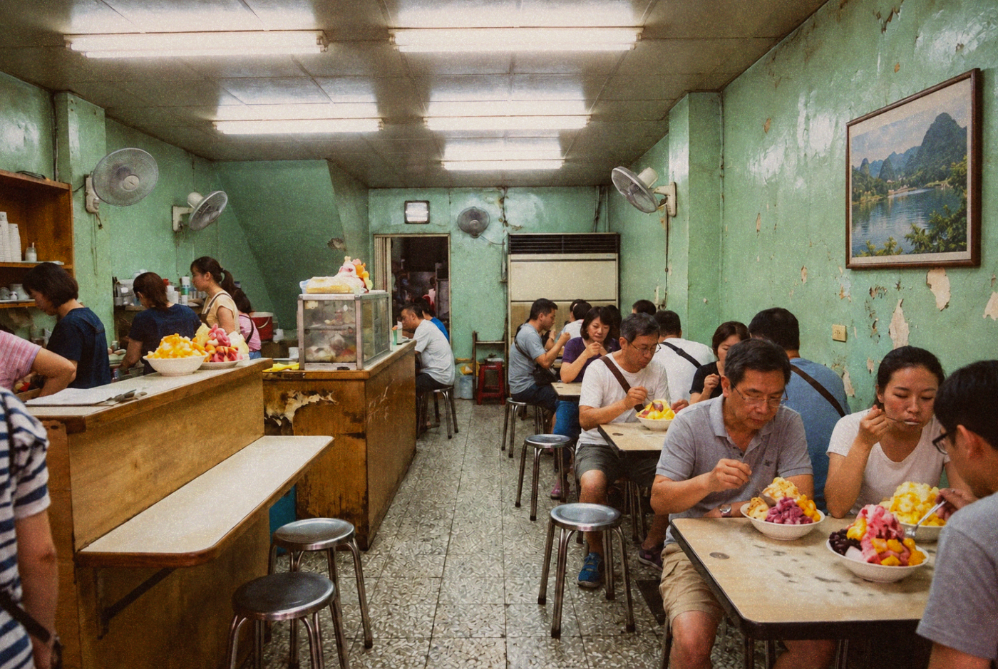 Customers eating shaved ice inside a neighborhood dessert shop
