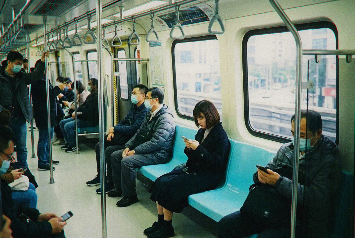 Interior of a Taipei MRT train car with passengers