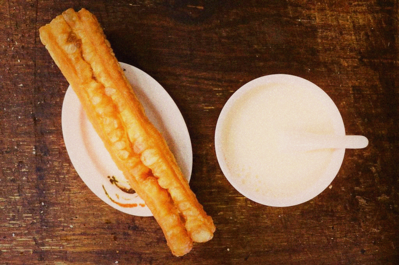 Traditional Taiwanese breakfast spread with soy milk and shaobing