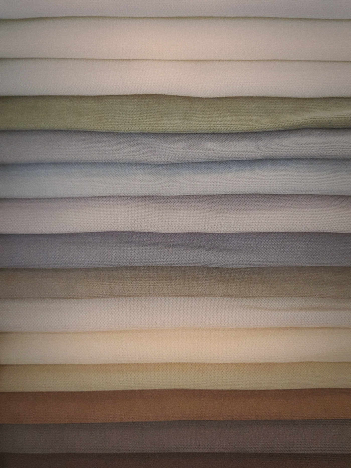 Close-up of natural linen fabric texture in warm light