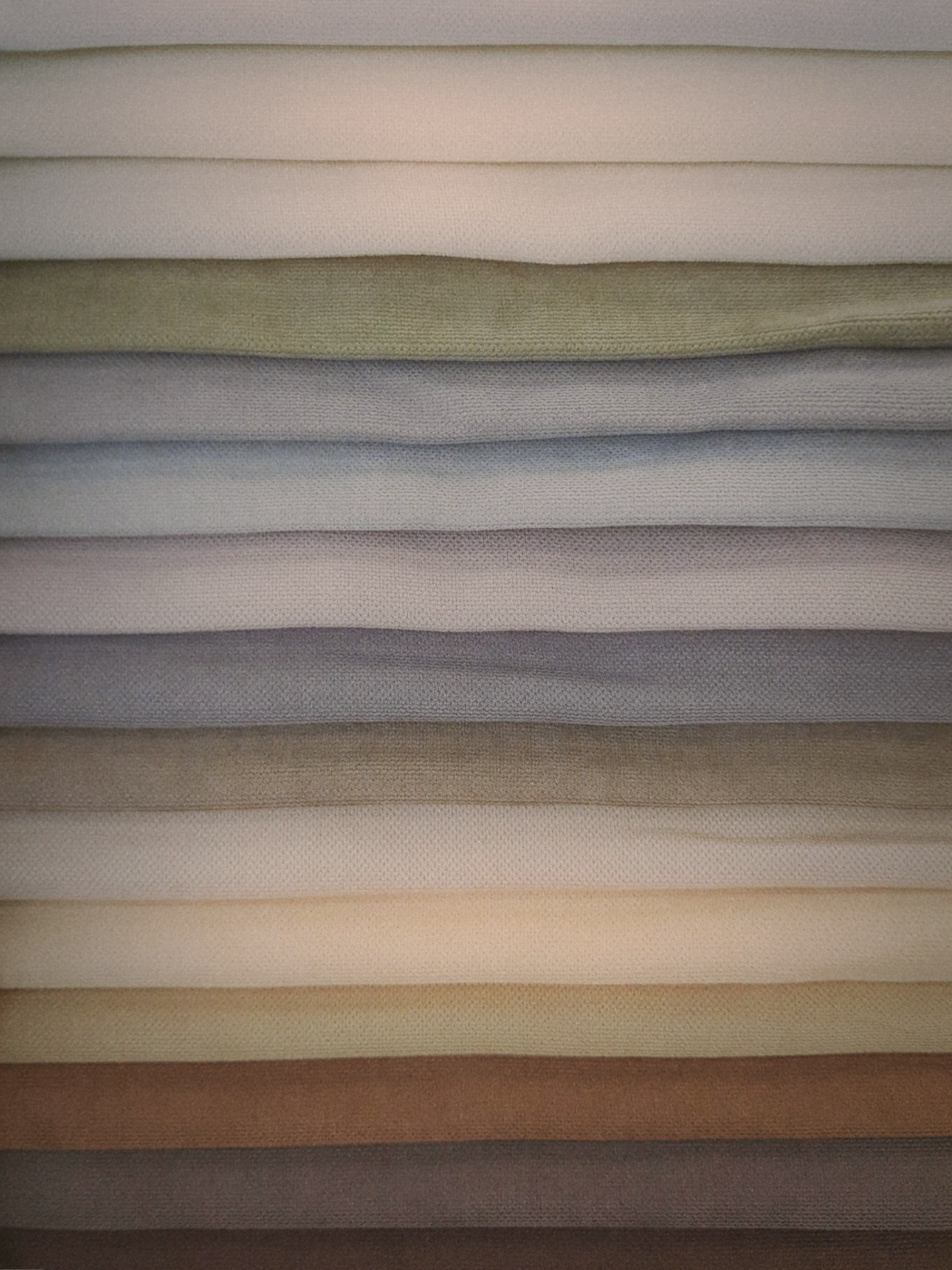 Close-up of natural linen fabric texture in warm light