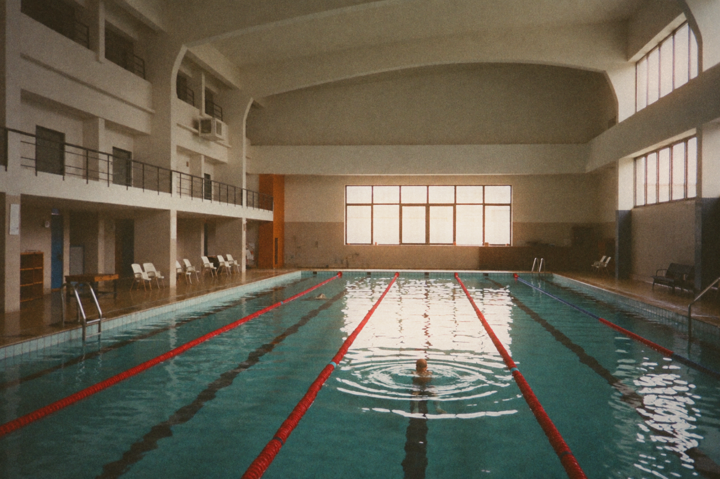Editorial illustration of an indoor swimming pool.