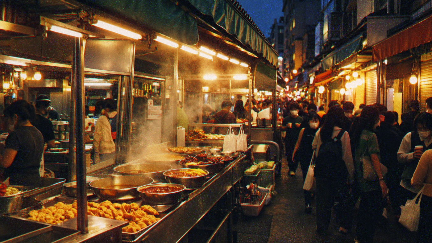 Illustration: people passing food stalls.