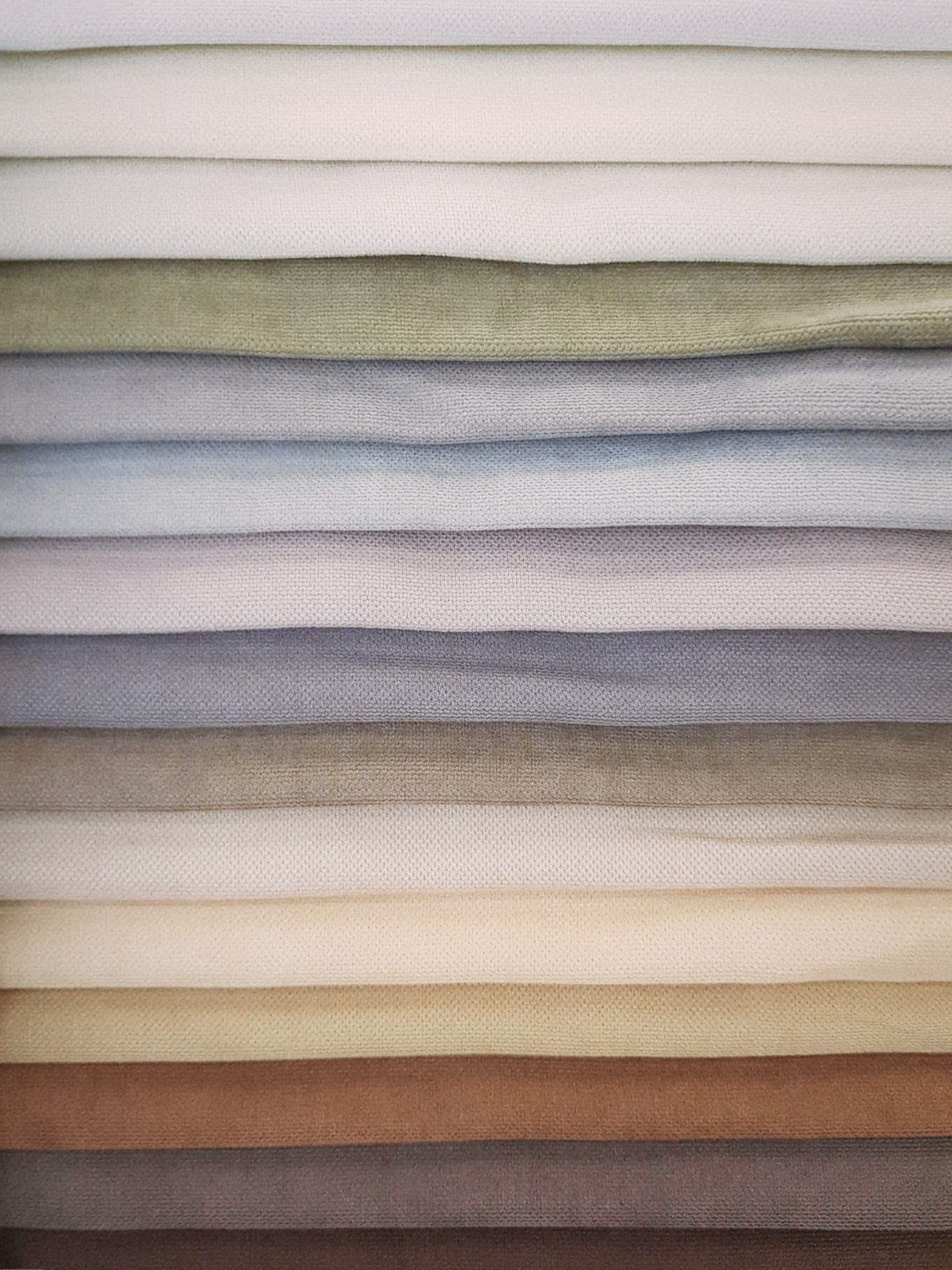Close-up of natural linen fabric texture in warm light