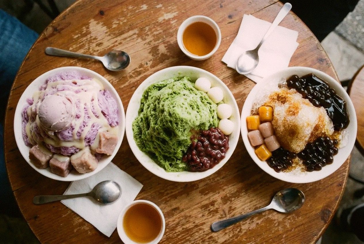 Three different bowls of Taiwanese shaved ice desserts from above