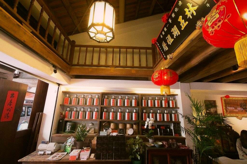 Metal tea canisters at a traditional Taipei tea shop