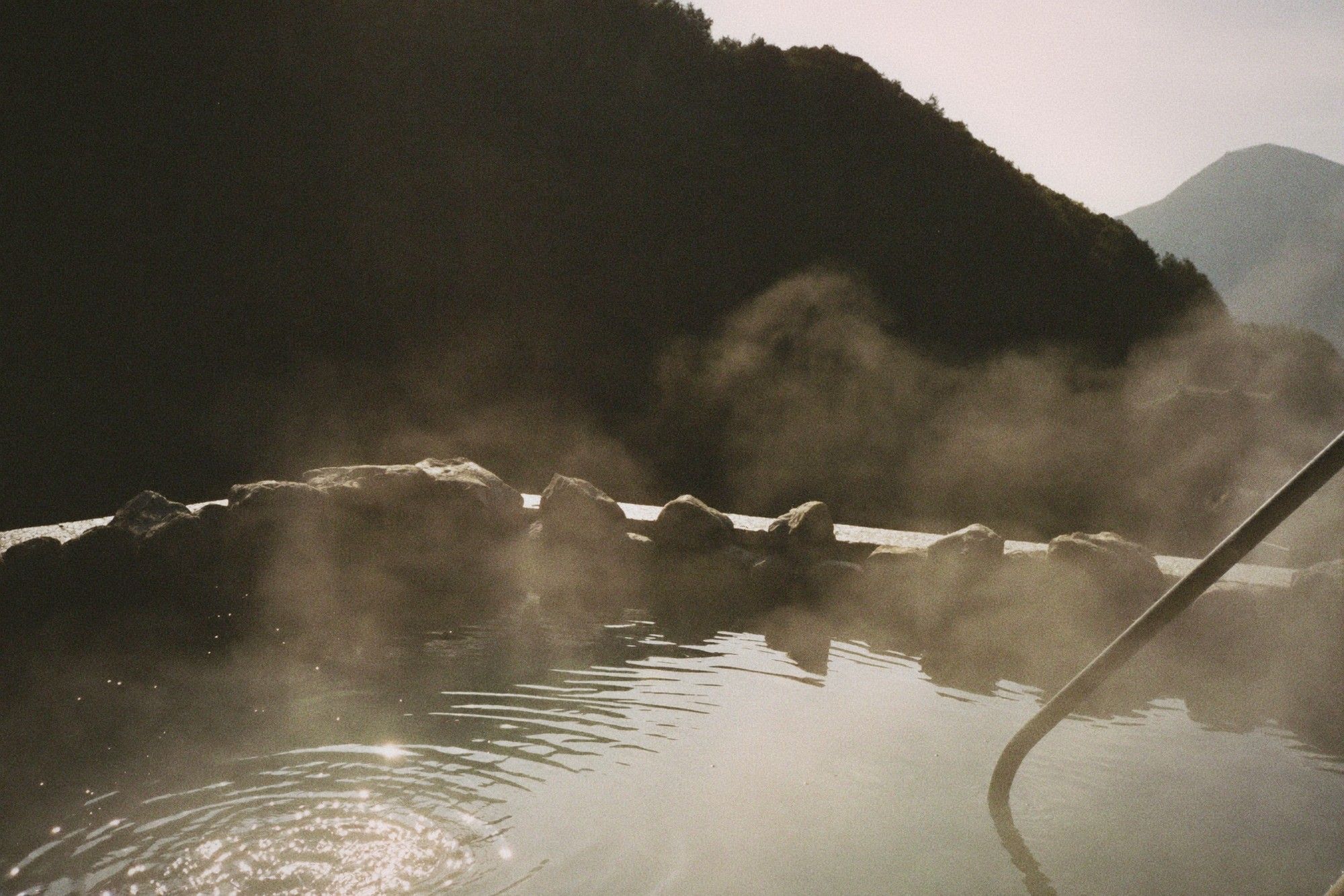 Mountain hot spring with steam