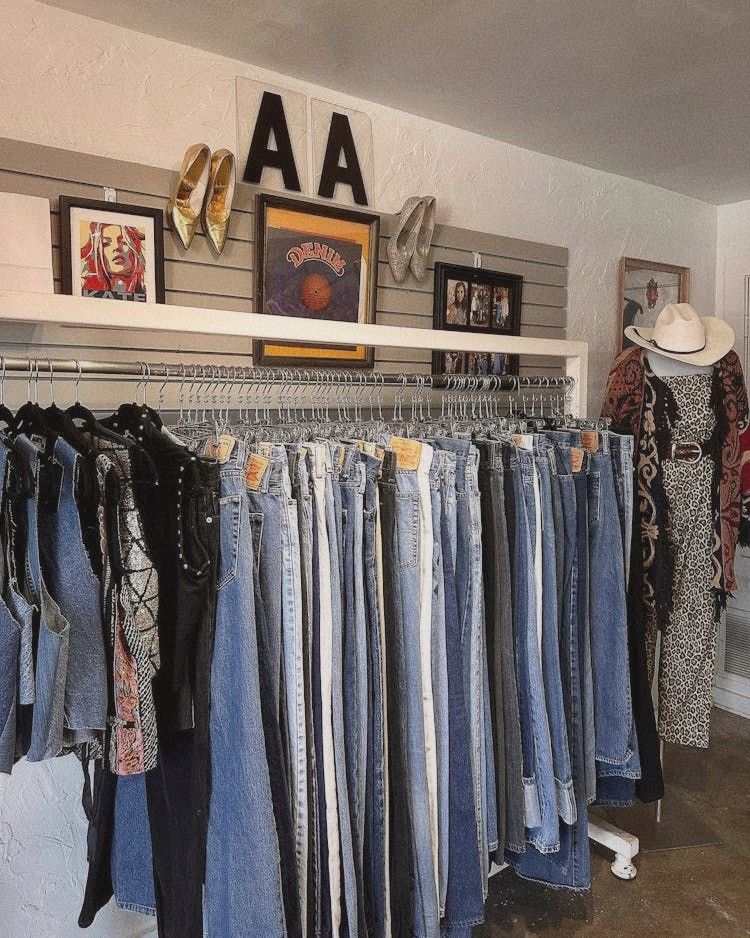 Vintage denim jacket displayed on a shop wall