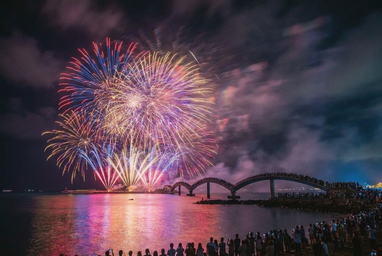 Penghu fireworks festival at night with colorful fireworks over the ocean