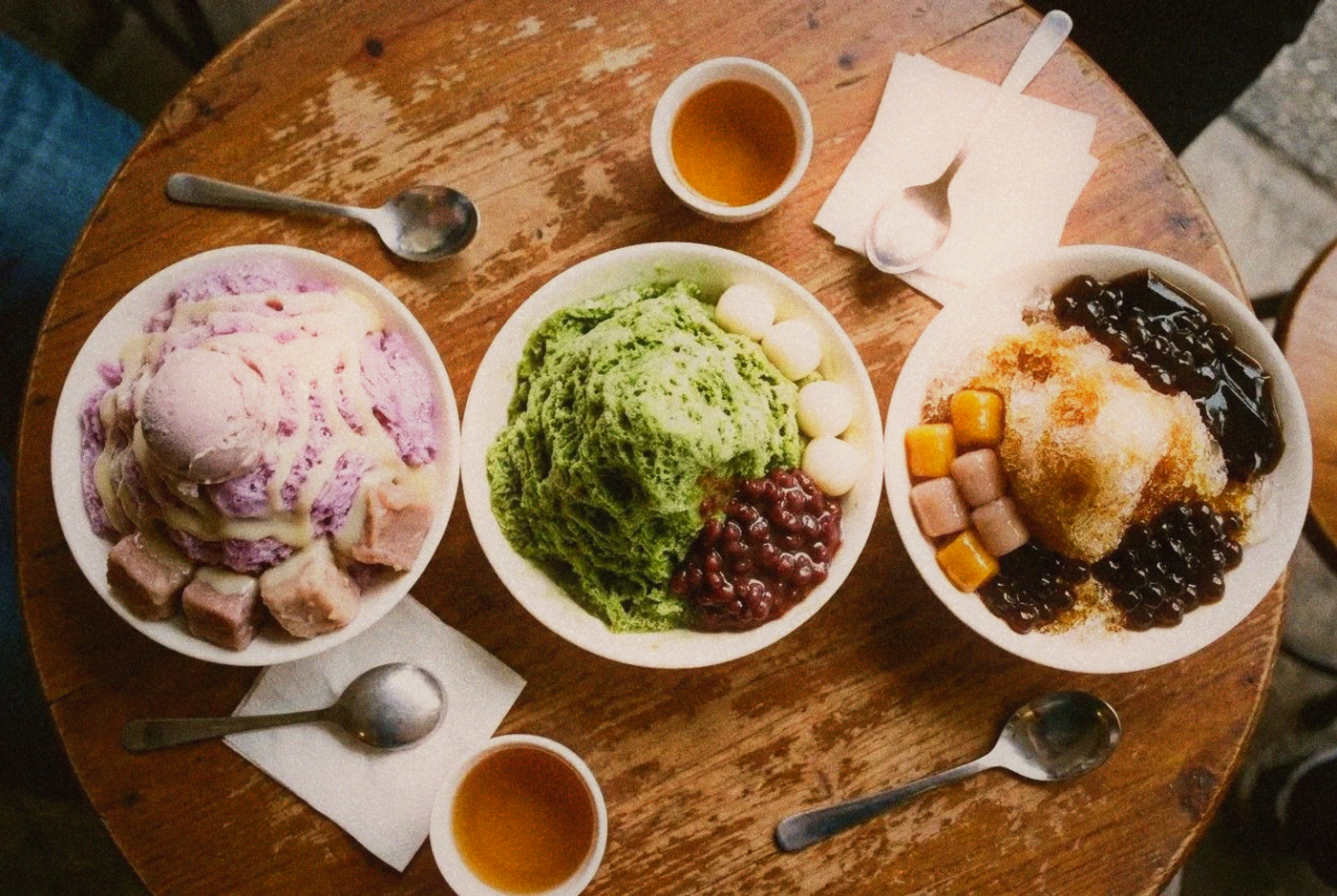 Three different bowls of Taiwanese shaved ice desserts from above