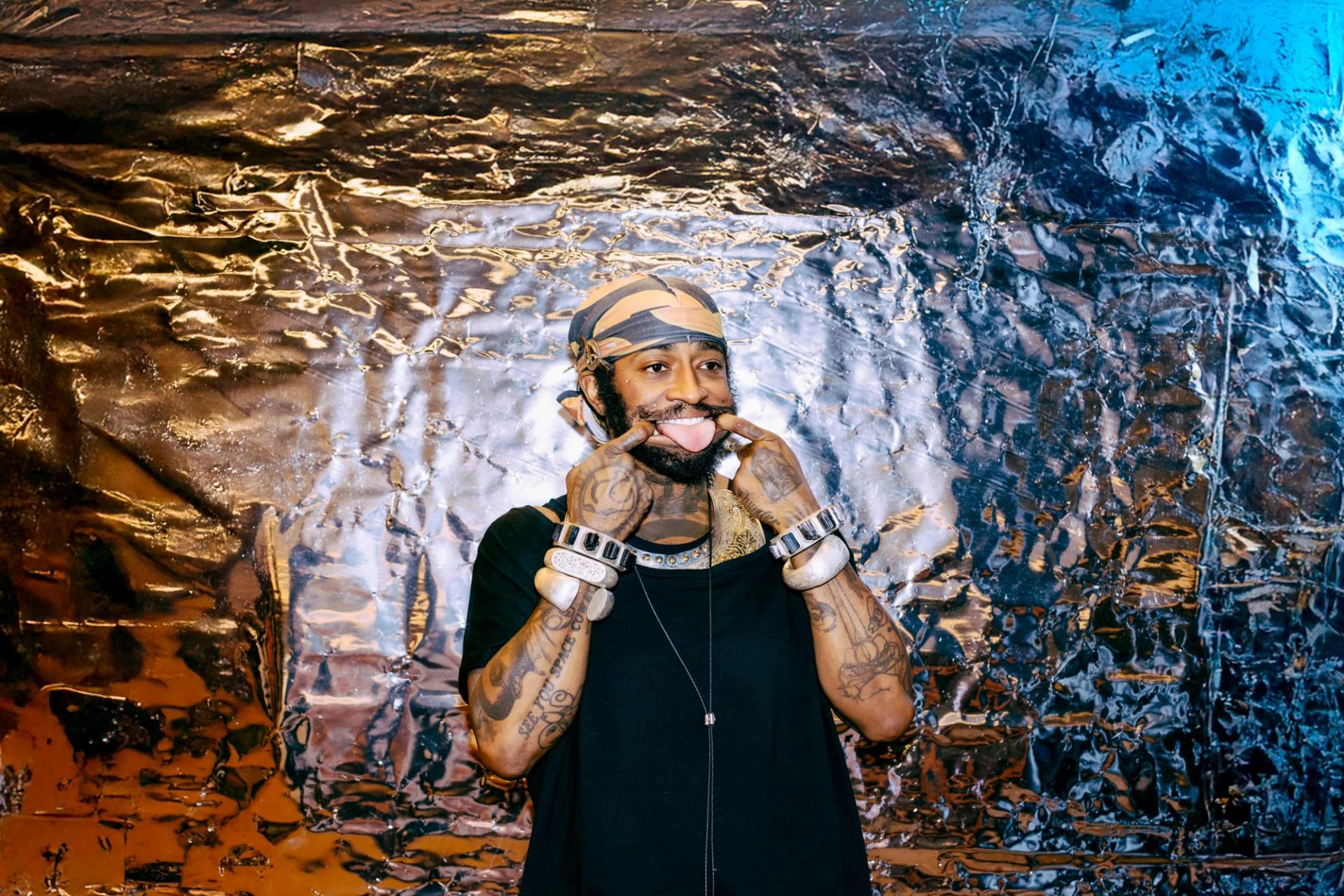 Thundercat portrait, making a funny face middle shot, photographed by Alan Cortés in Mexico City