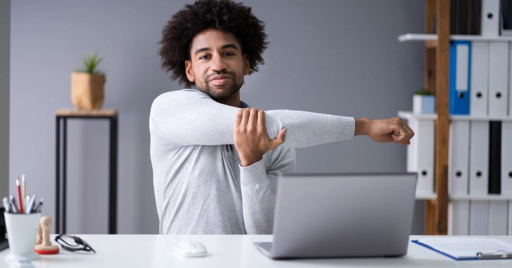 Illustration of a physical therapist guiding a virtual client through online exercises on a laptop