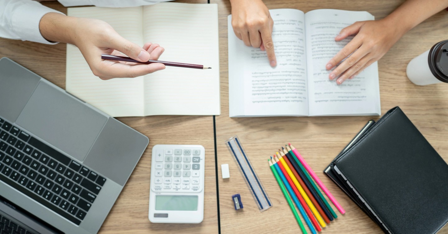 Illustration of an online tutor on a video call with students earning income teaching remotely