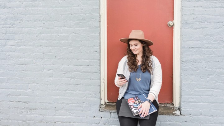 Portrait of artist and educator Emily Mills with her Podia website and product tour visuals