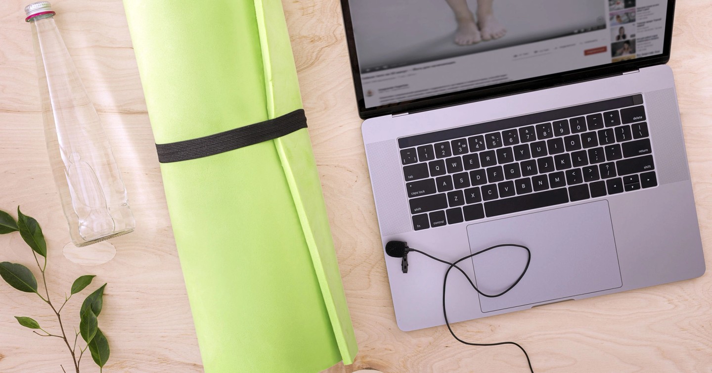 Illustration of email and chat message bubbles surrounded by wellness icons like leaves and yoga