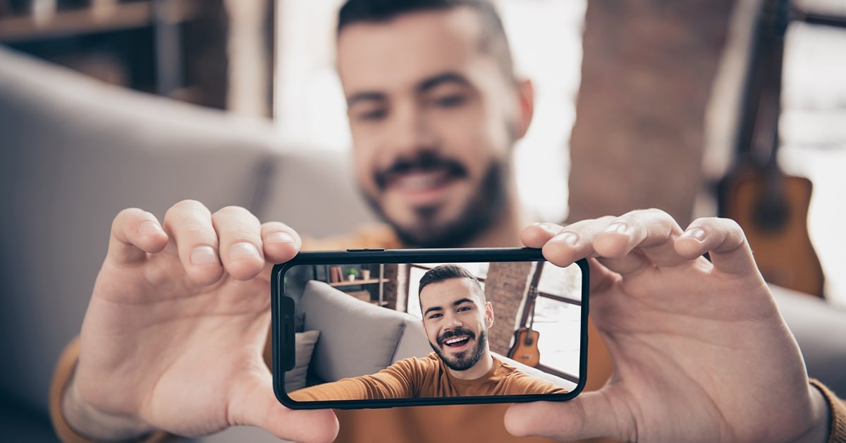 Illustration of an iPhone recording professional video with tripod and lighting setup