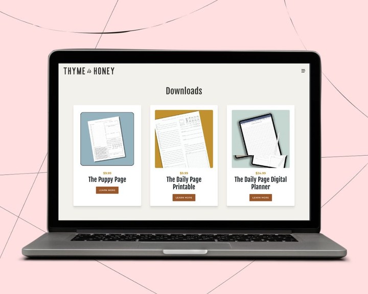 A laptop showing three printables on a website, as an example of what you can make for your printable digital product