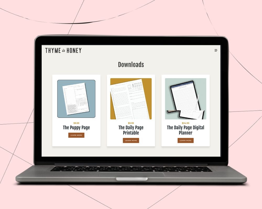 A laptop showing three printables on a website, as an example of what you can make for your printable digital product