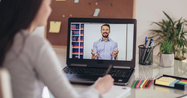 Illustration of selling information products with ebooks, video lessons, and digital content icons
