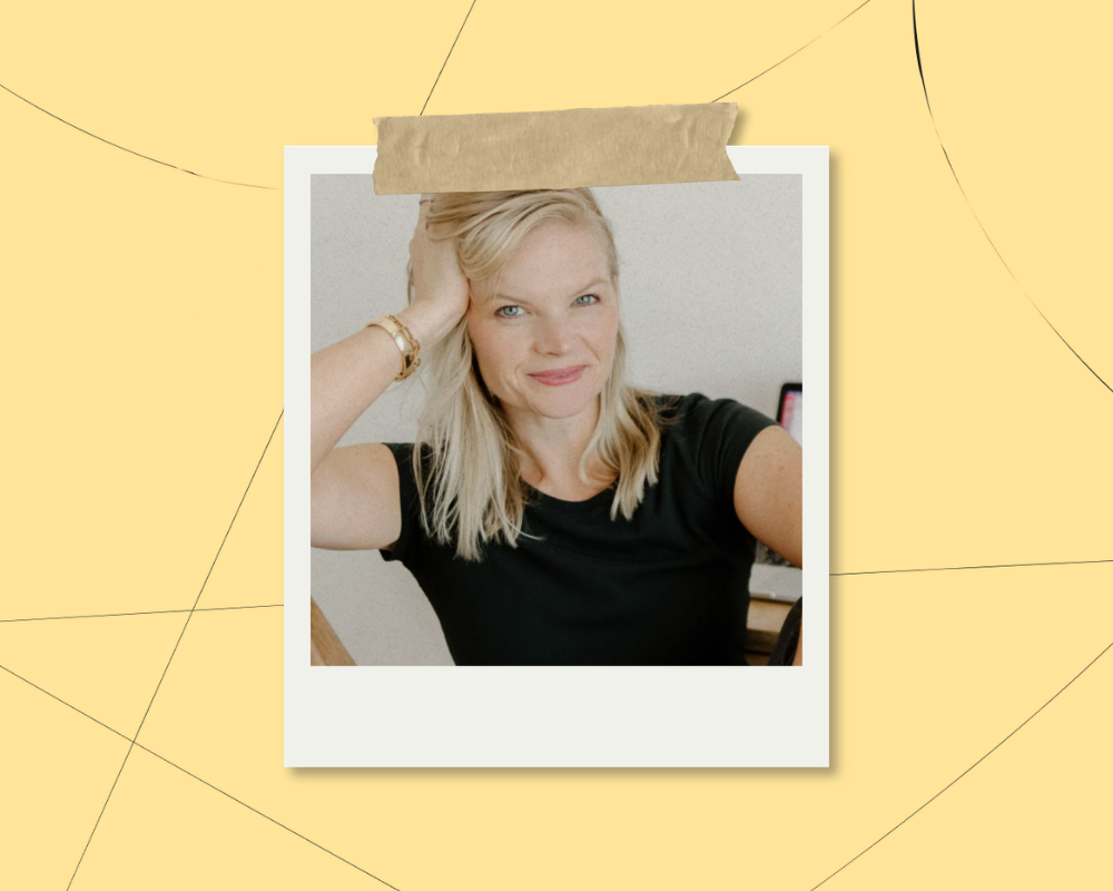 Portrait of creator Em Connors in front of her laptop, getting ready to launch her first online course