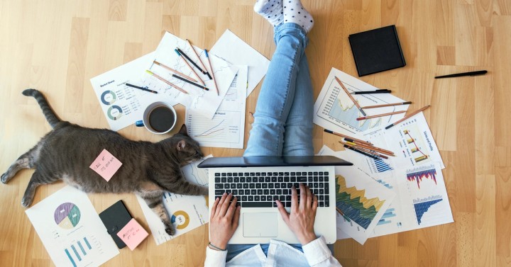 Illustration of a home office workspace with clock laptop and productivity boundaries between work and life