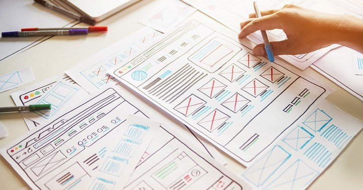 Illustration of a designer prototyping a first digital product in five iterative steps